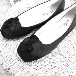 Romantic Soles Flats with large floral detail.